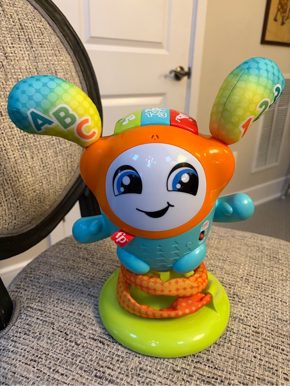 Fisher-Price Orange & Blue Bunny Learning Toy with Green Base